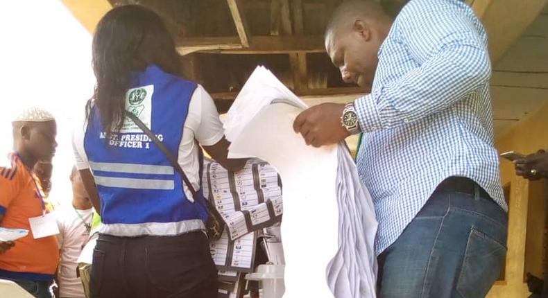 INEC officials sorting and counting ballots at Polling unit 004 and 005 of ward 1 at the ongoing supplementary election holding in Ibeju-Lekki state constituency I on Saturday (NAN)