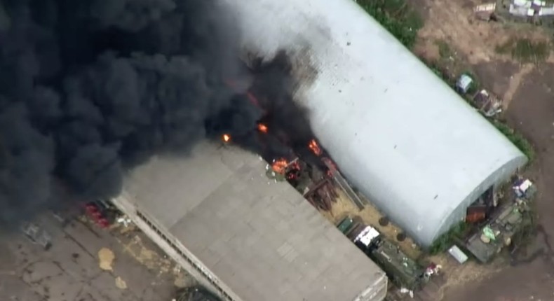 A still from a Ukrainian Army aerial video showing plumes of smoke and flame from what it says is a Russian radio jammer. It has been located to a city in Kharkiv Oblast.