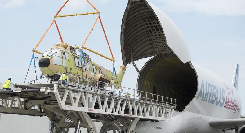 Airbus BelugaST loading helicopter.Airbus