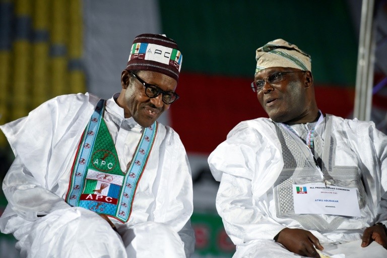 President Buhari is set to be sworn in on May 29 while Atiku maintains that he won the February 23 election [AFP] 