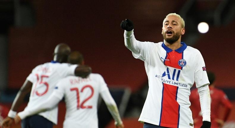 Neymar celebrates after scoring his second and Paris Saint-Germain's third goal in their Champions League win away to Manchester United on Wednesday