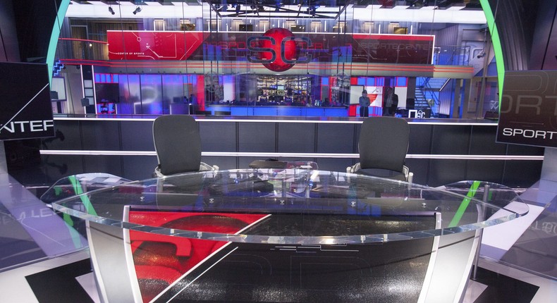 Many of the layoffs are tied to an effort to re-invent ESPN's flagship program, SportsCenter.