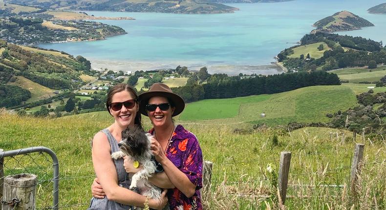 Jessica Wynne Lockhart the author (left) and her partner with Lexi the dog in Akaroa.