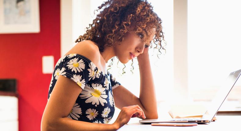 woman working on laptop at home