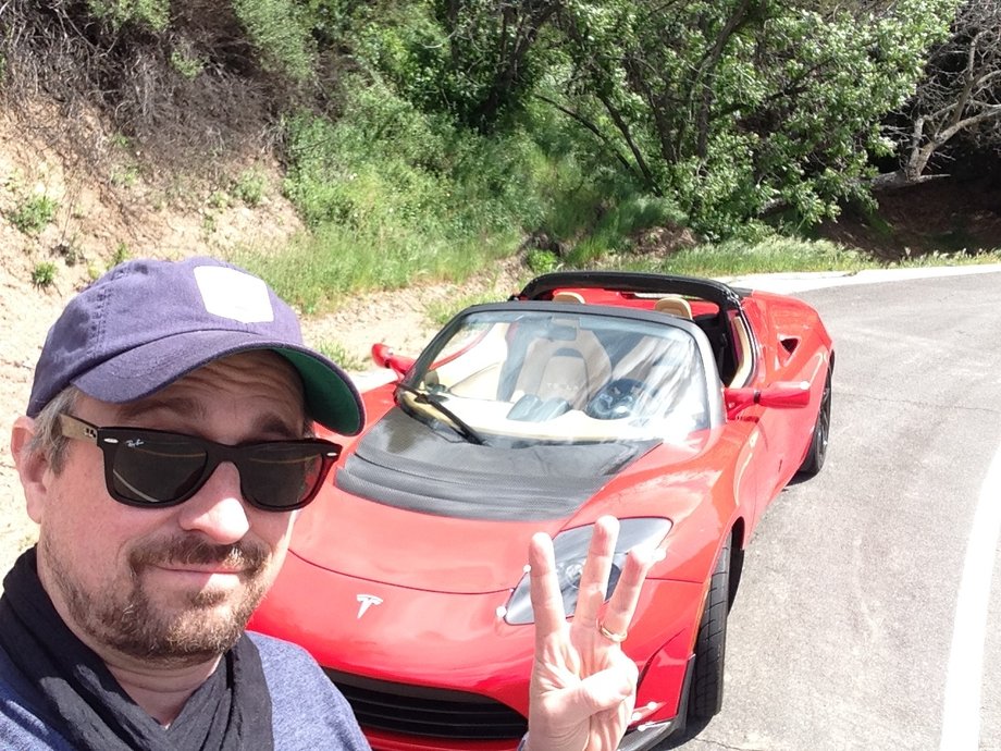 Sexy and red and a Tesla — not a bus, pickup, or semi.