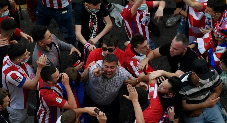 Athletico Madrid fans defeid local lockdown protocol to celebrate their league title on the steets Creator: OSCAR DEL POZO