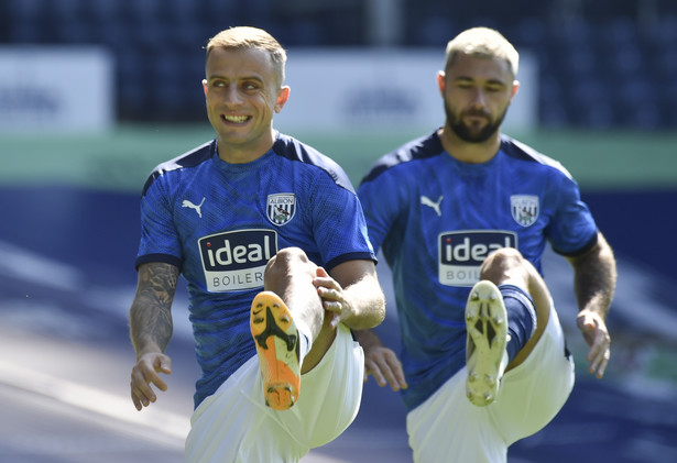 Kamil Grosicki i Charlie Austin