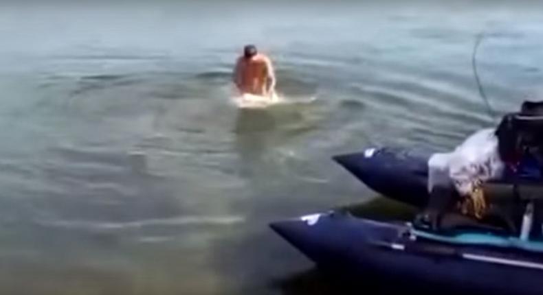 Man goes swimming naked; fish bites his penis