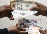 Naira gains ₦3.31 against dollar at official market