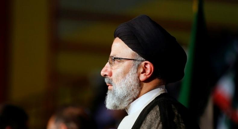 Iranian presidential election candidate Ebrahim Raisi looks on during a campaign rally in the capital Tehran on April 29, 2017