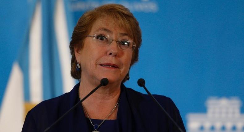 Chile's President Michelle Bachelet gestures during in Olivos, Buenos Aires province, on December 16, 2016