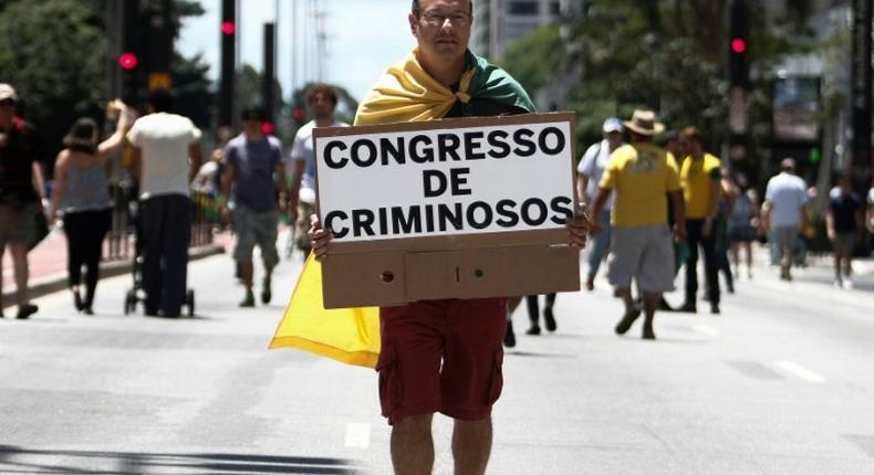 Demonstrators in Sao Paulo, Brazil march in support of investigations into a sprawling corruption scheme centered on state oil company Petrobras
