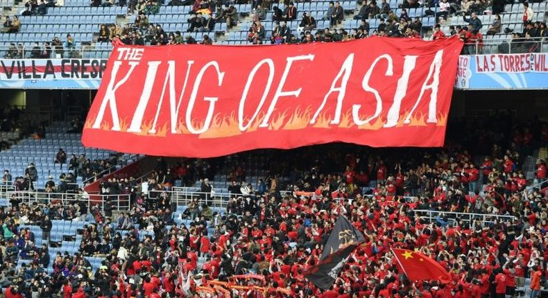 Supporters of Guangzhou Evergrande pictured in 2015 before a third-place Club World Cup match against Sanfreece Hiroshima