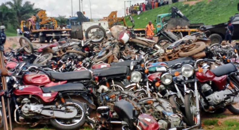 Impounded commercial motorcycles waiting to be crushed by a Join Task Force in Abuja.