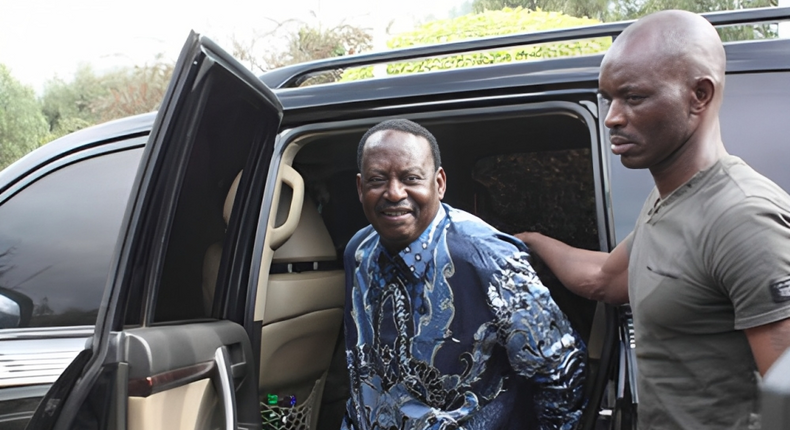File image of former Prime Minister Raila Odinga and his bodyguard, Maurice Ogeta
