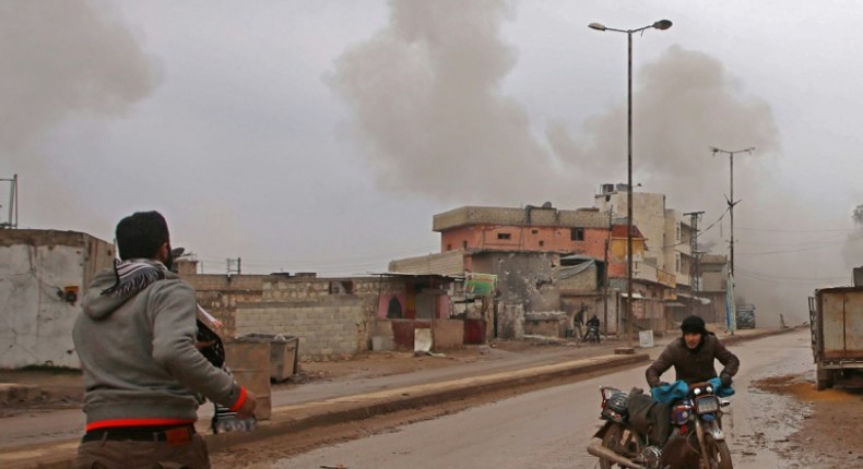 Some of the last remaining residents of the rebel-held town of Atareb flee as Syrian government forces draw ever closer in their offensive against the last major rebel pocket of Idlib