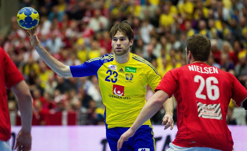 Sweden's Larsson celebrates his goal during the Men's European Handball Championship main round matc