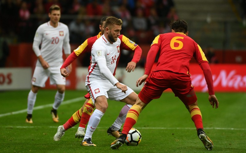 Jakub Błaszczykowski (2L) i Zarko Tomasevic (P)