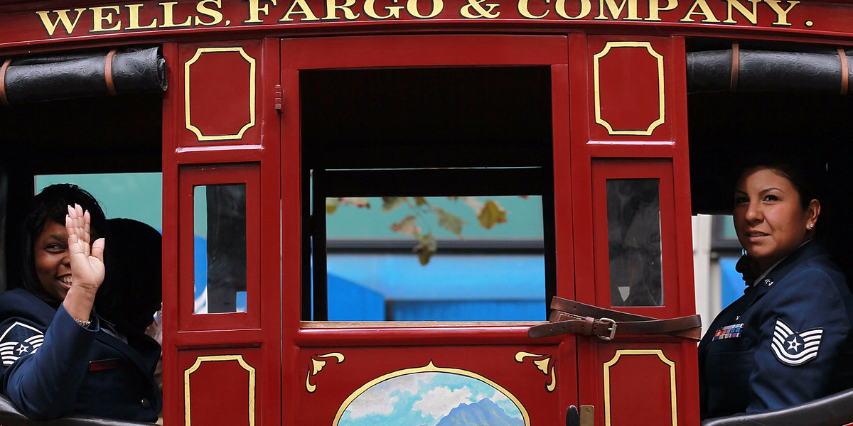 Members of the U.S. Air Force ride in the Wells Fargo stagecoach during the 92nd Annual San Francisco Veterans Day Parade on November 11, 2011 in San Francisco, California.