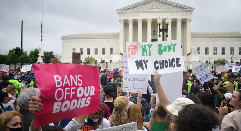 Activists march along Constitution Avenue to the US Supreme Court on May 14, 2022.