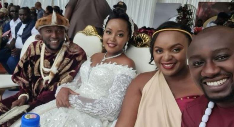 Citizen TV's Stephen Letoo (far left) poses for a photo alongside his wife Irene Letoo (centre) and NTV's Kennedy Mureithi (right)