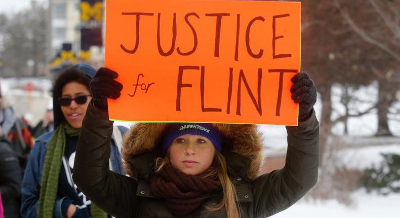 Demonstrators in Flint, Michigan, protest over the city's contaminated water crisis in March 2016.