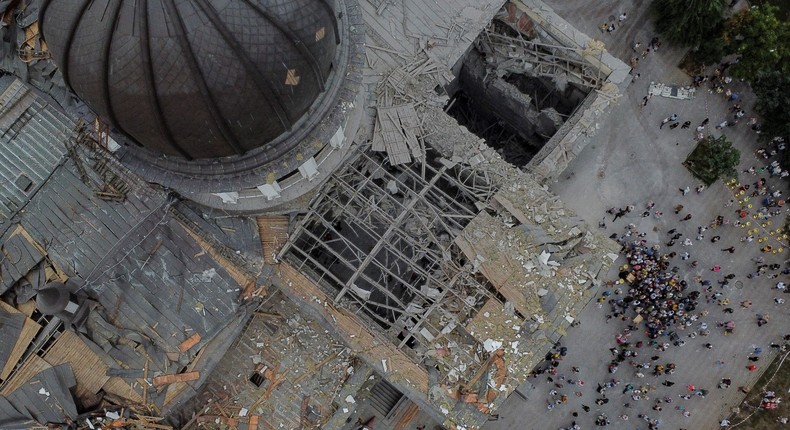 Believers gather next to the Transfiguration Cathedral, damaged by a Russian missile strike, in Odesa, Ukraine.Yan Dobronosov/Reuters