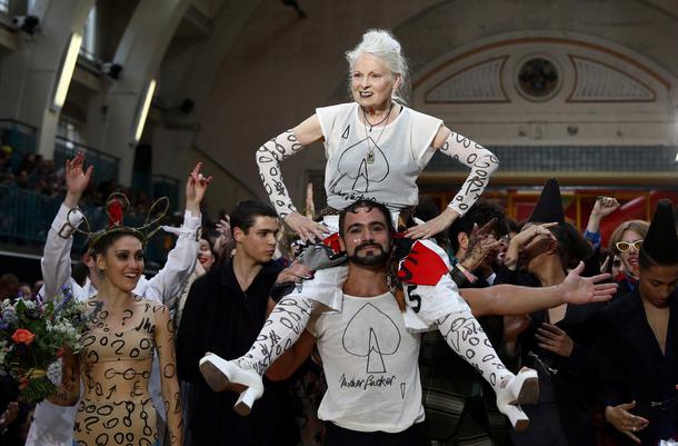 Designer Vivienne Westwood is carried after her catwalk show at London Fashion Week Men's in London