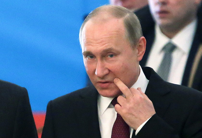 Russian President and Presidential candidate Vladimir Putin at a polling station during the presiden