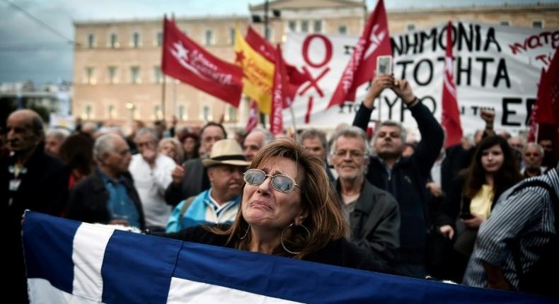 A demonstration outside the Greek parliament on May 18, 2017 amid voting on new austerity measures. The IMF has offered a plan to break the deadlock with European nations over debt relief