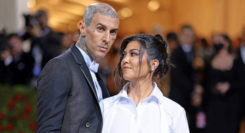 Travis Barker and Kourtney Kardashian are parents again. [Dimitrios Kambouris/Getty Images for The Met Museum/Vogue]