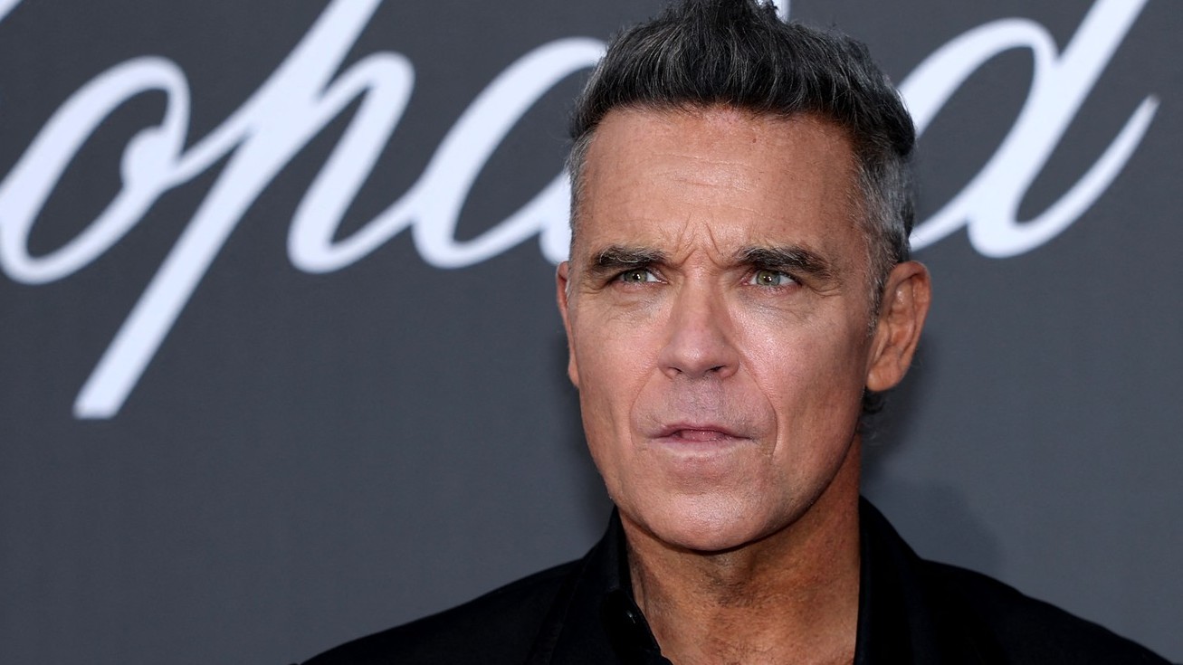 Spevák Robbie Williams.