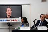 Edward Snowden speaks via video link during a news conference in New York 