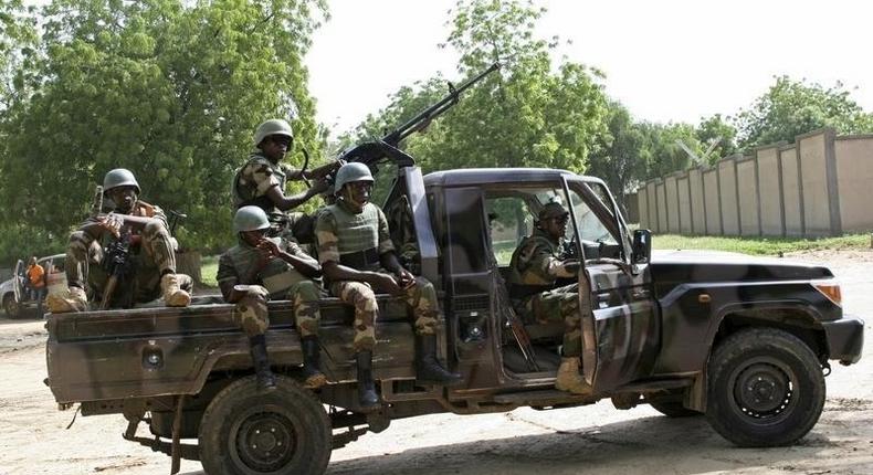 Niger soldiers provide security for an anti-Boko Haram summit in Diffa city, Niger September 3, 2015. 