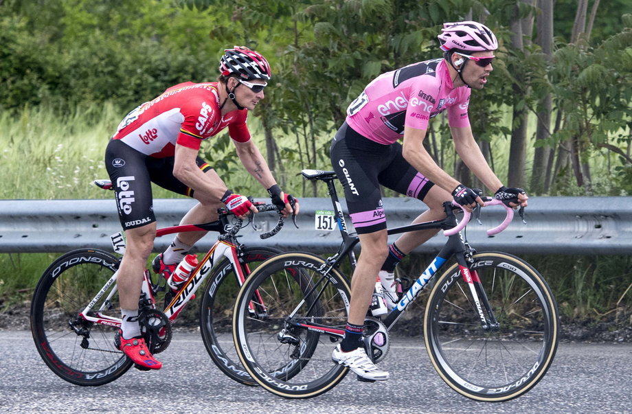 Sprint ace André Greipel, left, and race leader Tom Dumoulin on stage 7. Dumoulin took the leader's pink jersey on stage 1 but later lost it. Back then, he said he wasn't racing for overall victory, but he attacked on stage 6 and reclaimed the lead.