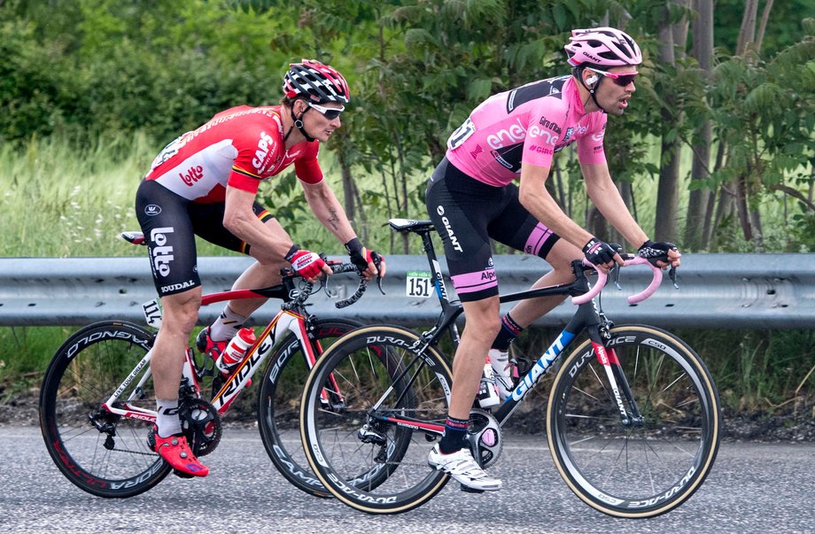 Sprint ace André Greipel, left, and race leader Tom Dumoulin on stage 7. Dumoulin took the leader's pink jersey on stage 1 but later lost it. Back then, he said he wasn't racing for overall victory, but he attacked on stage 6 and reclaimed the lead.