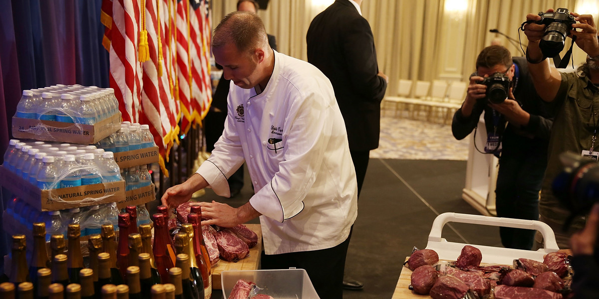 A display of products that Republican presidential candidate Donald Trump has for guests, including meat, wine and water are prepared before a press conference at the Trump National Golf Club Jupiter.