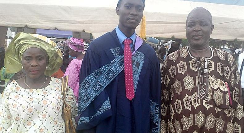 Arowosegbe Micheal Aderibigbe, with his parents, Mr and Mrs Aderibigbe