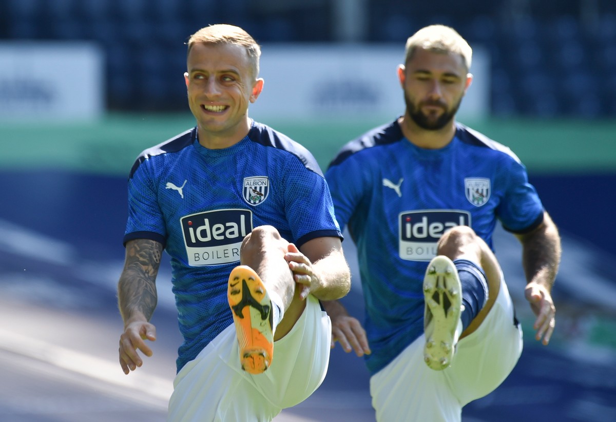 Kamil Grosicki i Charlie Austin