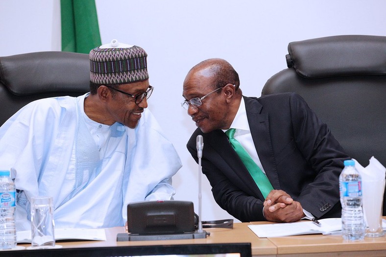 President Muhammadu Buhari and CBN Governor, Godwin Emefiele, share thoughts at a function (Punch) 