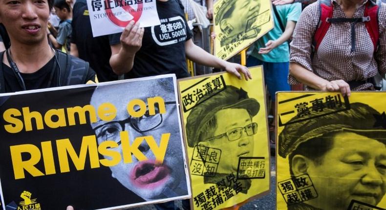 The three activists were handed jail sentences for their role in 2014's massive Umbrella Movement protests, which called for fully free leadership elections and were an unprecedented challenge to Beijing