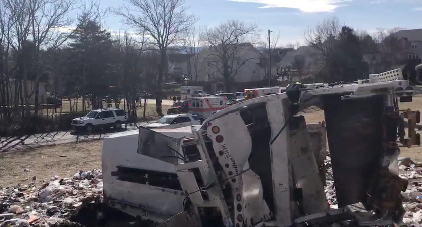 View of the scene following the accident when a train traveling from Washington to West Virginia car