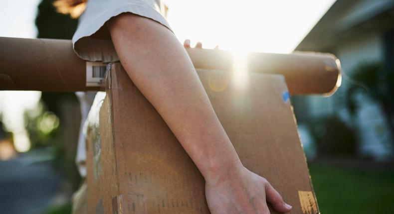 A stock image shows somebody delivering mail.The Good Brigade/Getty Images