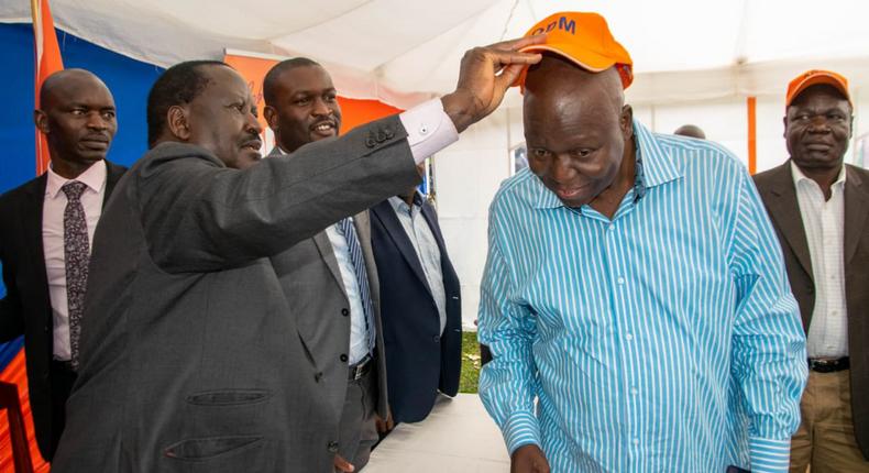 Jakoyo Midiwo and Raila Odinga 