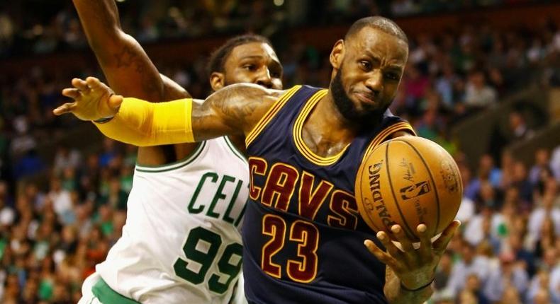 LeBron James of the Cleveland Cavaliers fights off a challenge from Jae Crowder of the Boston Celtics on May 19, 2017 in Boston, Massachusetts