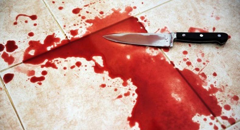 blood stained knife (Shutterstock)