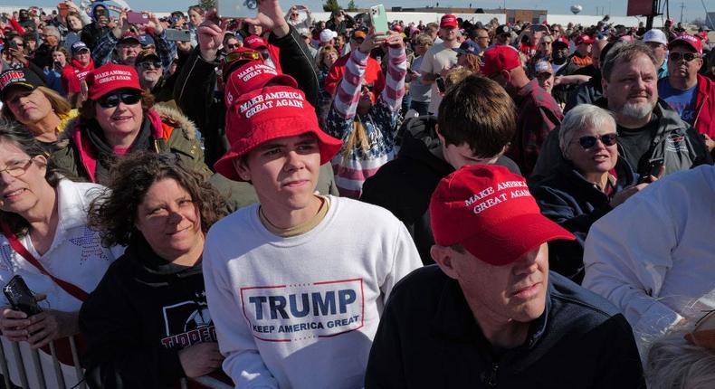 Guests listen as Republican presidential candidate former President Donald Trump speaks to supporters during a rally at the Dayton International Airport on March 16, 2024, in Vandalia, Ohio.Scott Olson/Getty Images