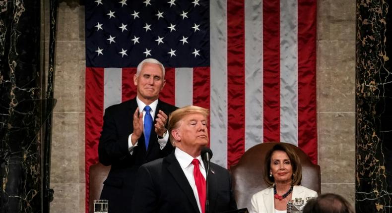 US President Donald Trump delivers the State of the Union address, alongside Vice President Mike Pence and Speaker of the House Nancy Pelosi, at the US Capitol in Washington, DC, on February 5, 2019