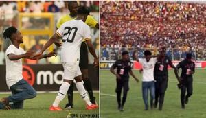 Video: Pitch invader taken away by Police during Ghana vs Angola game