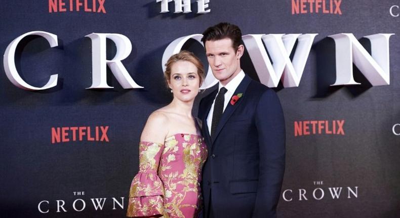 British actors Matt Smith (R) and Claire Foy pose as they arrive on the red carpet to attend the world premiere of the the TV show 'The Crown', in London, on November 1, 2016